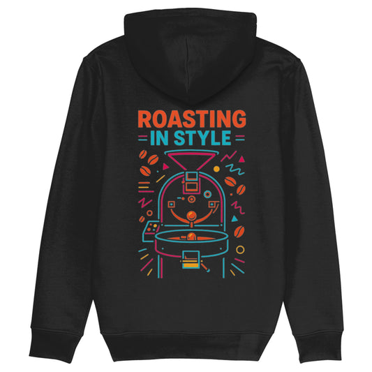 Zwarte hoodie met kleurrijke abstracte koffiebrander en tekst βRoasting In Styleβ β duurzame specialty coffee hoodie voor koffiebranders en koffieliefhebbers.